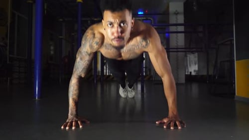 Strong Black Man Doing Push Ups at Modern Gym Afro American Sportsman Exercising at Sport Club