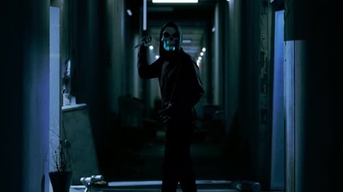 Sinister Masked Figure with Knife in Derelict Corridor