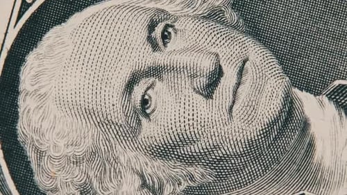 CloseUp of a Rotating One Dollar Bill With a Portrait of George Washington