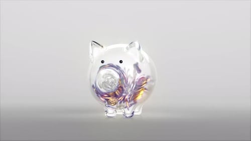 Glass Piggy Bank Overflowing with Coins