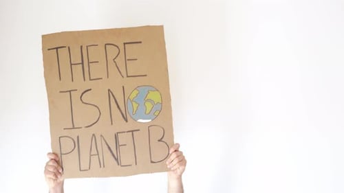 Environmental Message on Cardboard Sign