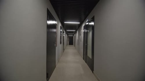 Corridor Embellished with Office Doors and Nameplates Extend