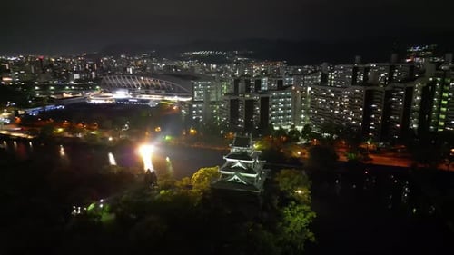 Aerial video of the Hiroshima skyline with Hiroshima Castle in Japan