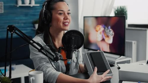 Female Technology Vlogger Unboxing New Mobile Phone