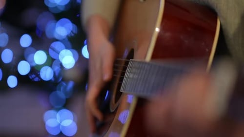 Acoustic Guitar Music with Christmas Lights Bokeh