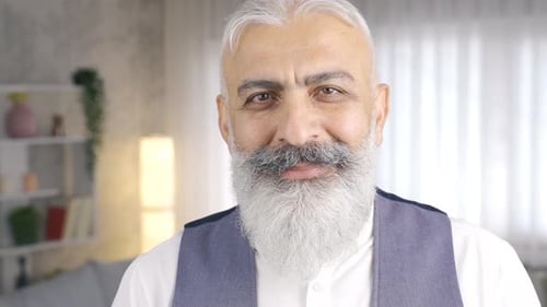 Smiling Senior Man Portrait with Gray Hair and Beard