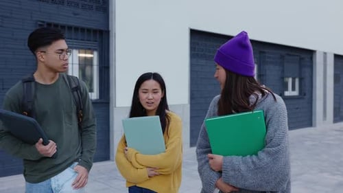 Group of Happy Asian Students Walking at College Campus
