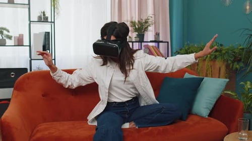 Woman Enjoys Virtual Reality Experience at Home