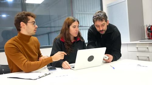 Engineers of a Industry Working with Laptop in the Office