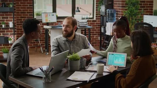 Diverse Colleagues Meeting in Modern Urban Workplace