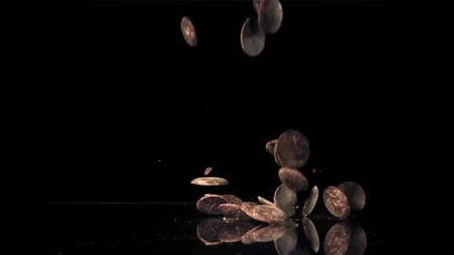 Dark Chocolate Chips Fly and Fall Filmed on a Highspeed Camera at 1000 Fps