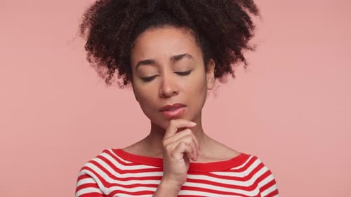 Woman Thinking Deeply in Close Up Portrait