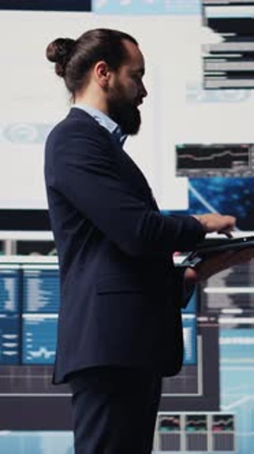 Vertical Video Economy Expert Reviewing Financial Data and KPI Dashboards