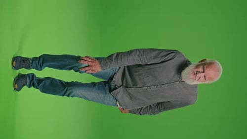 Man Holding Knee in Pain with Pills