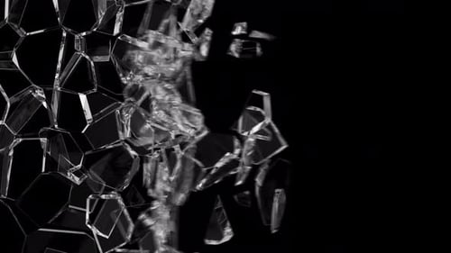 Broken glass shards flying to the left of the screen.