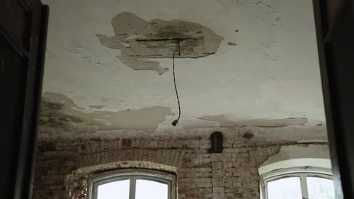Interior of Abandoned, Distressed Building with Peeling Paint