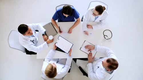 Medical Professionals Meeting from Above in Clean Office