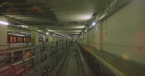Inside view of a train traveling underground. Concept of transportation, communication, travel.