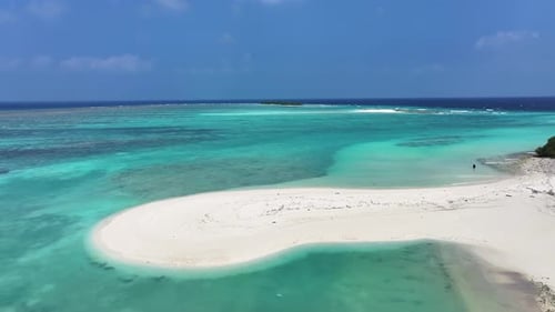 Aerial view of island with white sandy beach, Maldives.