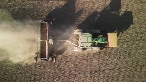 Tractor on the field seeding wheat