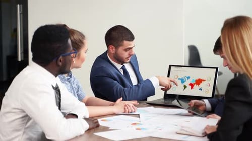 Diverse Team Meeting for Financial Growth Strategy