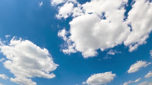 Time Lapse Clouds Floating in a Blue Sky