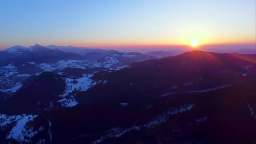 Erial View of the Sunset in a Beautiful Mountain Winter Landscape