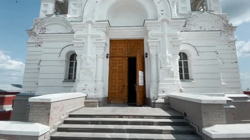A huge Orthodox church. Clip. A beautiful large white church with golden domes and a beautiful clean