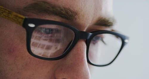 Close Up of Man's Eyes with Glasses