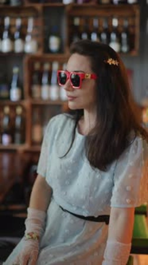 A Vintage Inspired Fashion Shoot Set in a Charming Urban Bar to Capture Elegance and Style