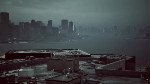 Overcast Cityscape View From a Rooftop Overlooking a Harbor at Dusk