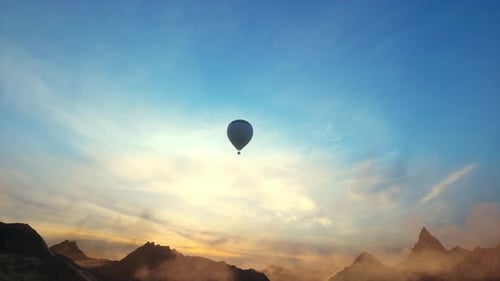 Scenic Hot Air Balloon Ride Above Mountainous Landscape