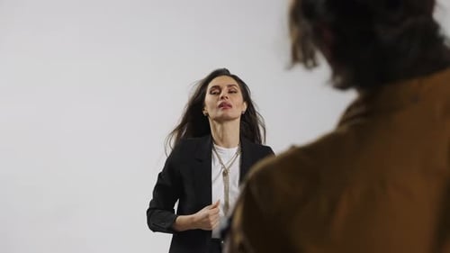 Model and Production Team in the Studio Attractive Woman Posing Photographer Taking Pictures