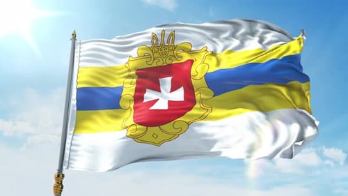 Waving Flag with Coat of Arms Against Blue Sky