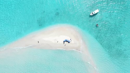 Top Down Aerial View of Tropical Seascape of Atoll Sandbank Island in Maldives