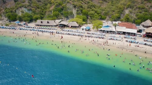 Aerial view of Active Beach, Speedboats, and Touristic Towers – Playa Blanca, Santa Marta