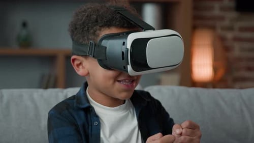 Boy Wearing VR Headset Playing Video Game