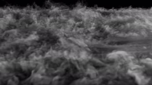 Smoke Swirls Over The Ground 4K Loop