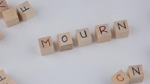 mourn wooden words
