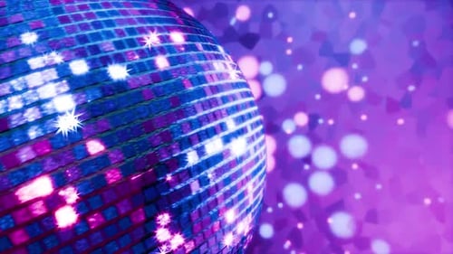 Looping 3D animation of disco ball rotation. Smooth rotation of disco ball with glare on mirrors.