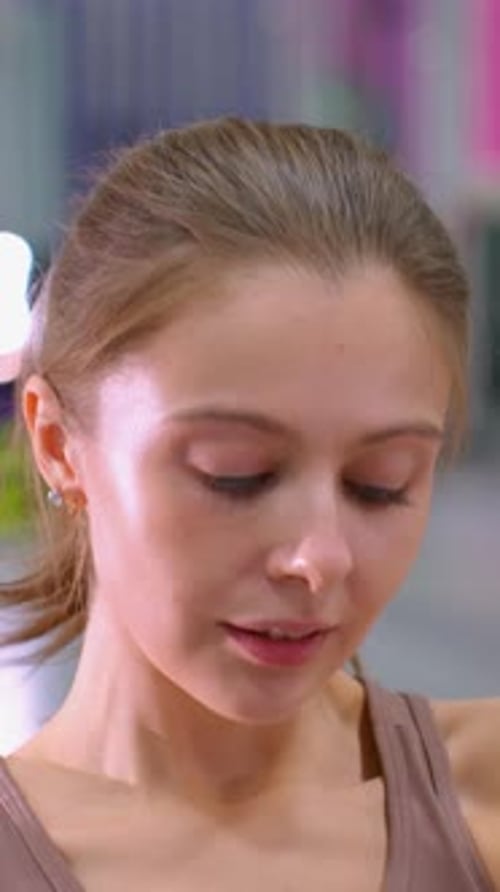 Close Up of Woman Engaged in Fitness Exercise with Mirror Reflection