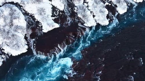 Incredible River with Turquoise Water Many Small Waterfalls Flowing Down From a Volcanic Hill