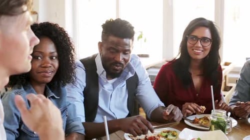 Friends Enjoying Lunch Together at a Bright Restaurant