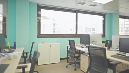 Empty Modern Office Space Transforming with Glass Partitions
