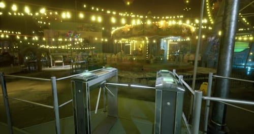Nighttime Carnival Atmosphere with Lights and Carousel in a Vibrant Park