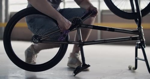 BMX Bicycle Repair in Urban Setting