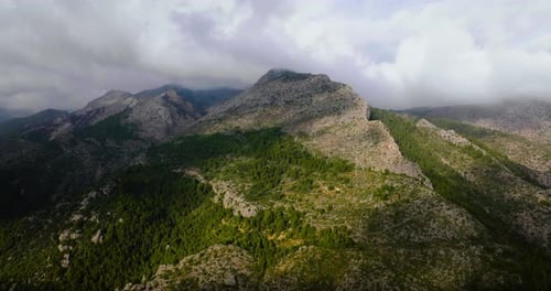 Beautiful Rocky Mountain Landscape in Summer Cloudy Sky