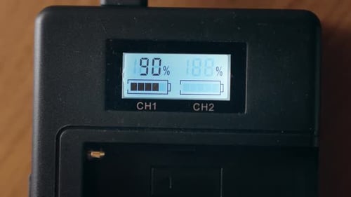 Battery Charger Shows Charging Progress Close Up