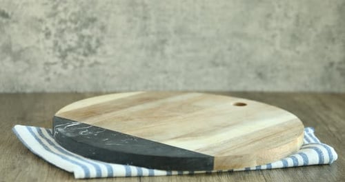 Cutting Boards Stacked on a Wooden Table
