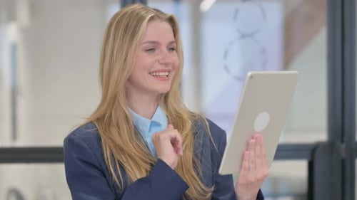 Woman Having Video Call in Office Setting
